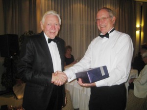 Keith Pacey receiving his prize from Gordon Sellars